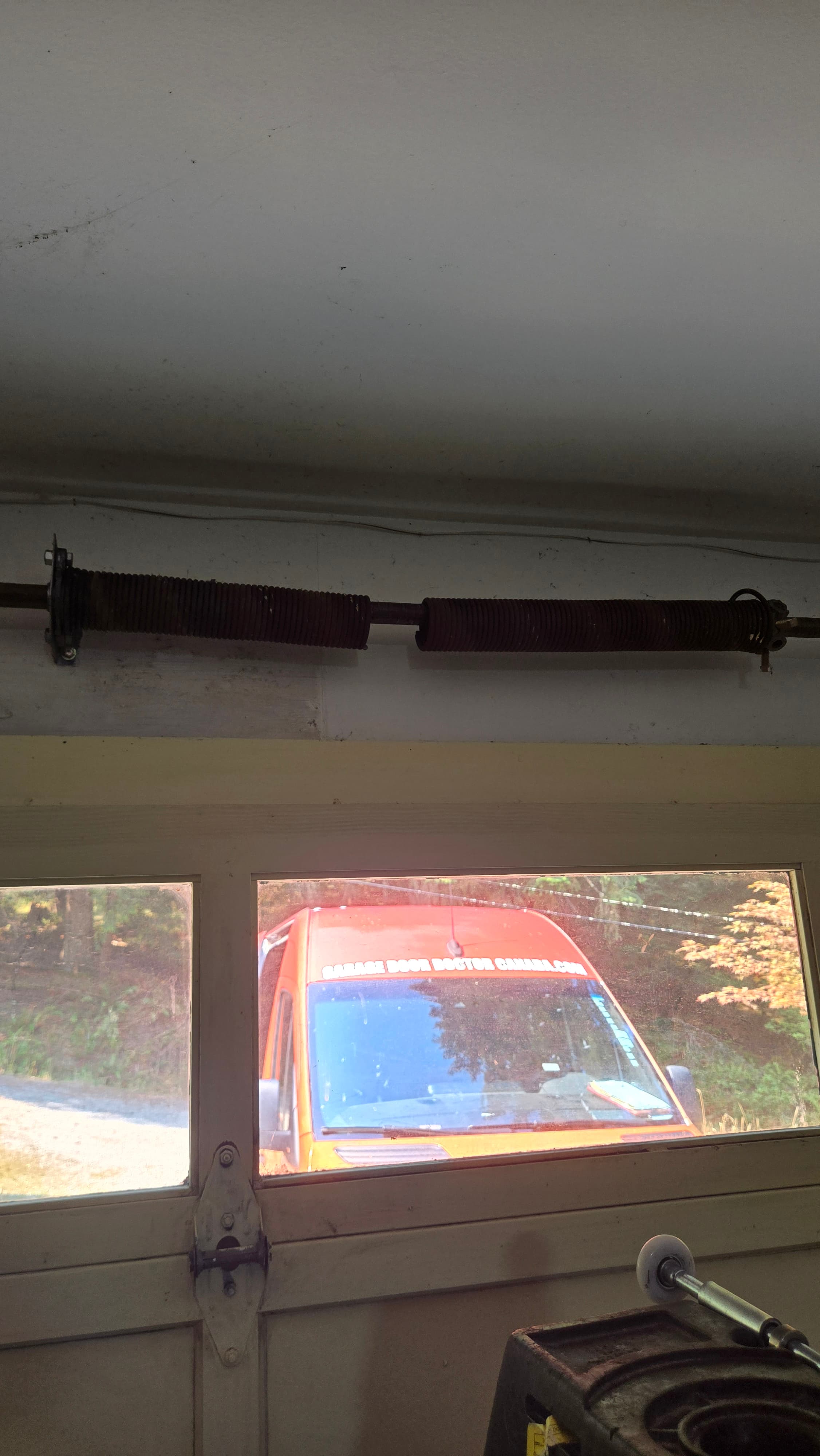Loose Garage Door Hinges Can Damage Panels in Nanaimo